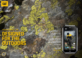 Cat advertisement background is a stone with moss, displaying a picture of mobile phone with a mountain biker wearing a yellow shirt. Ross Woodhall - Action & Lifestyle Photography
