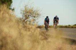 two cyclist out road biking along a quiet road Ross Woodhall - Action & Lifestyle Photography