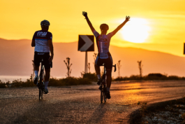 two road bikers cycling during the sunset Ross Woodhall - Action & Lifestyle Photography