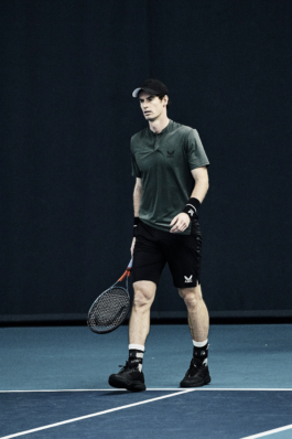 UK tennis player Andy Murray. In action playing tennis, wearing Andy Murray Castore AMC tennis clothing, including arm sweatbands and cap. shot at National Tennis centre in London Ross Woodhall - Action & Lifestyle Photography