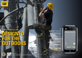 Cat advertisement for mobile phone, man taking a call up a steel pylon on a ladder wearing a safety belt with yellow hard hat. Ross Woodhall - Action & Lifestyle Photography