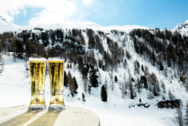 two pint glasses of larger on a table outside in an alpine setting. Ross Woodhall - Action & Lifestyle Photography