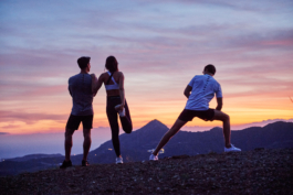three runners taking the view in and stretching. wearing Castore. Ross Woodhall - Action & Lifestyle Photography
