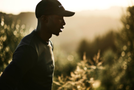 male jogger, runner, wearing a cap, with Castore clothing on. Ross Woodhall - Action & Lifestyle Photography