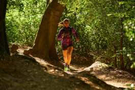 female jogger in a woodland setting. Ross Woodhall - Action & Lifestyle Photography