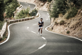 male jogging down the road. Athletic, outside sport. Ross Woodhall - Action & Lifestyle Photography