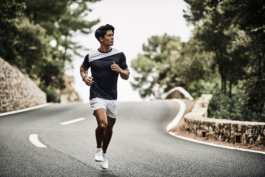 male jogging down the road. Athletic, outside sport. Ross Woodhall - Action & Lifestyle Photography