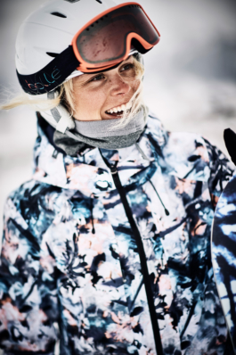 female skier, wearing ski clothes, ski lifestyle. Ross Woodhall - Action & Lifestyle Photography