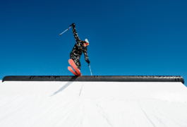 Park skier, skiing along a rail. Ross Woodhall - Action & Lifestyle Photography