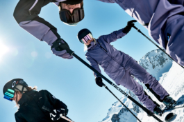 three skiers taking a rest, with two looking towards the camera and one away. Ross Woodhall - Action & Lifestyle Photography