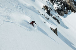Solo skier skiing off piste downhill Ross Woodhall - Action & Lifestyle Photography