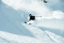 Female skier off piste coming down the mountain Ross Woodhall - Action & Lifestyle Photography