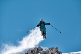 skier jumping off piste Ross Woodhall - Action & Lifestyle Photography