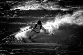 Black and white image of a skier off piste. Ross Woodhall - Action & Lifestyle Photography